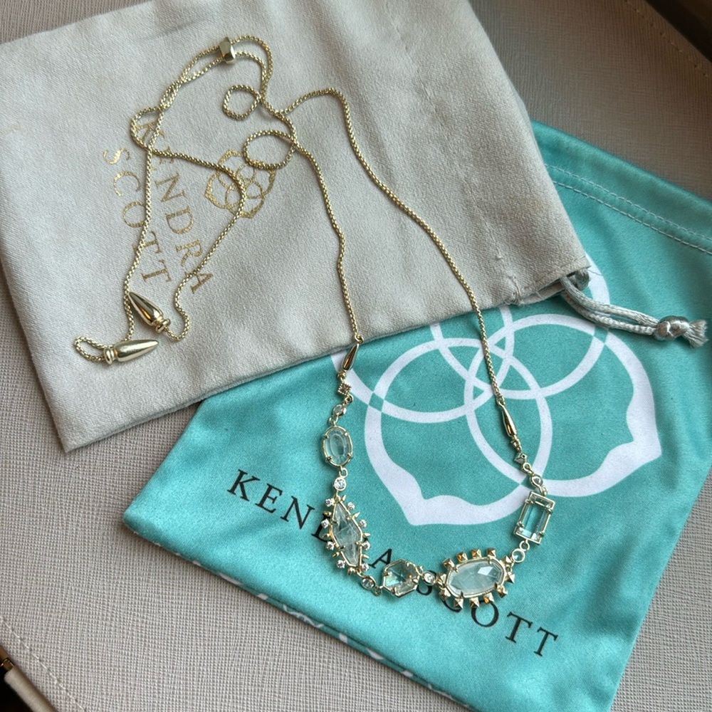 Kendra Scott gold and clear crystal necklace.